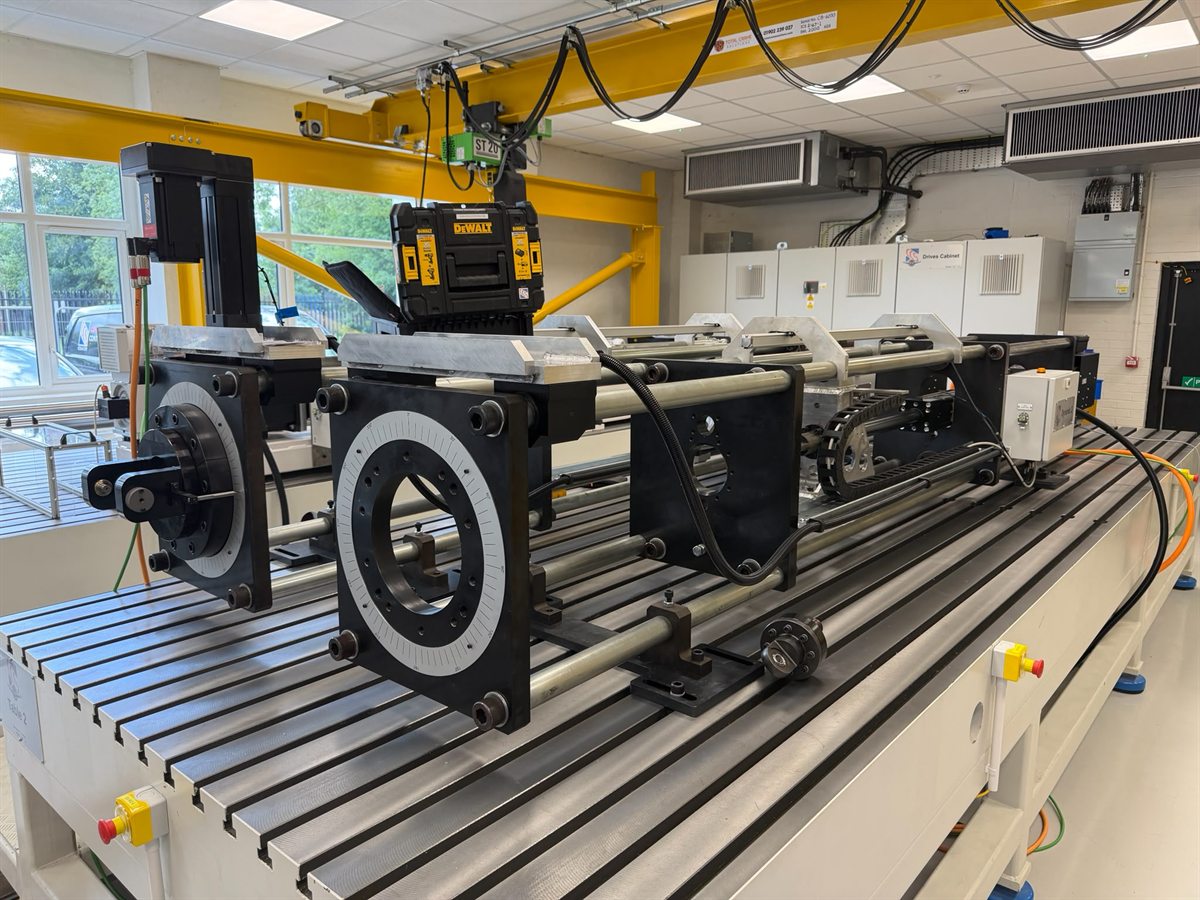 Close-up of a rotary servo actuator station on the test bed